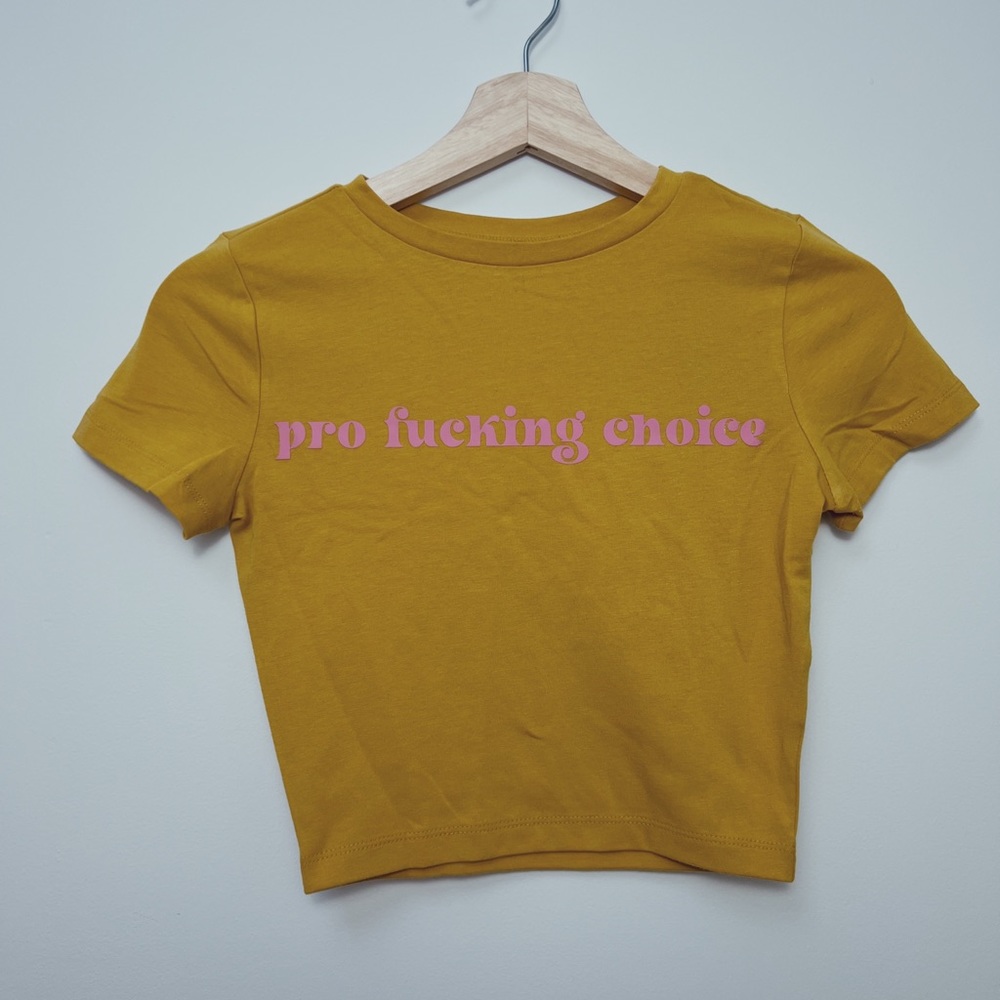 Pro Choice cropped t shirt in mustard yellow plus pink logo